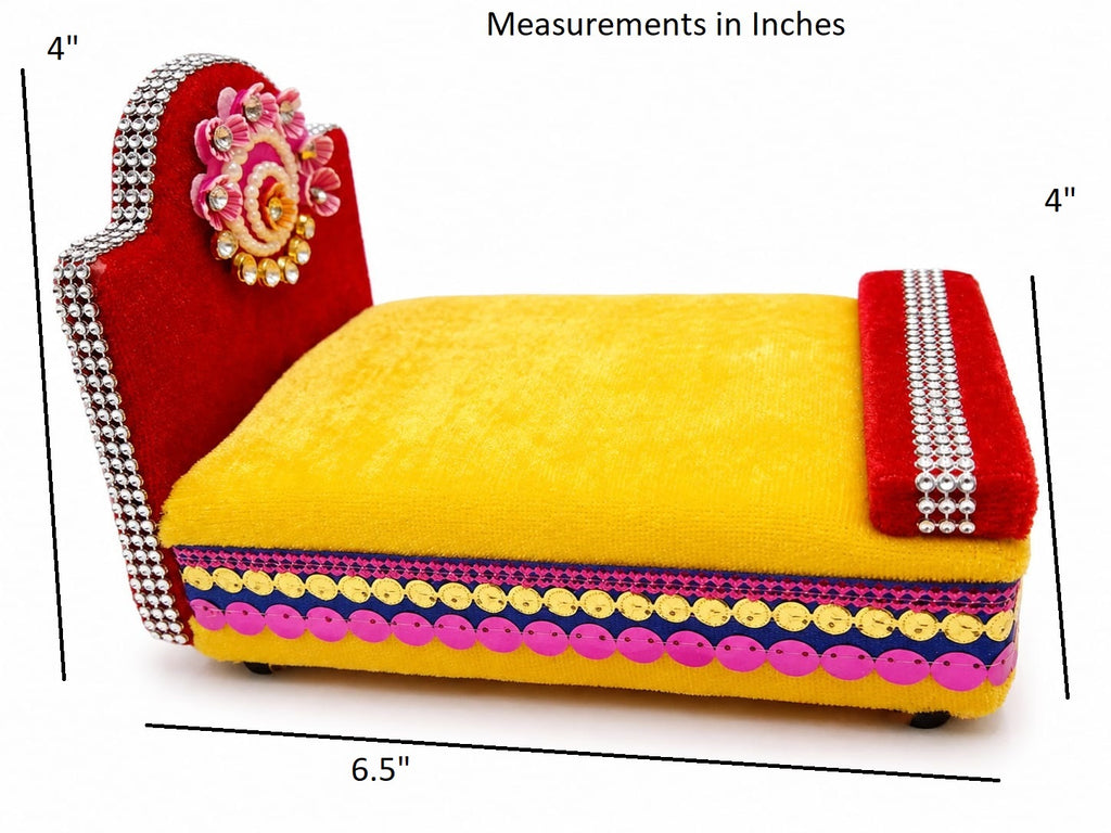 A small decorative bed or cushion set shown with measurement lines and labels indicating dimensions in inches on a white background.
